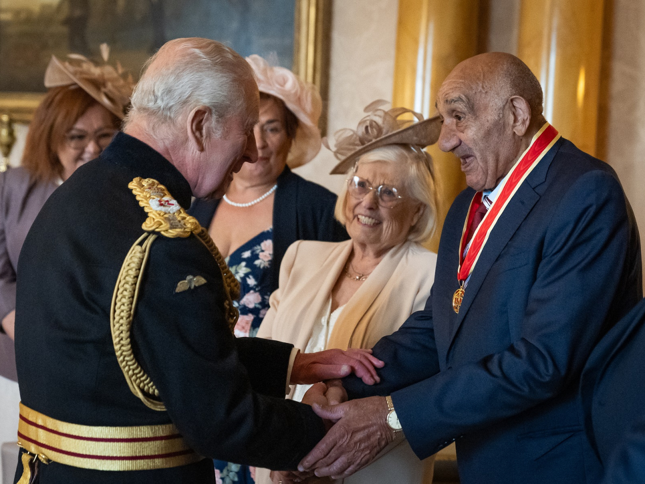 Billy Boston was knighted by King Charles in a ceremony at Buckingham Palace in London in June 2025. File photo: AFP