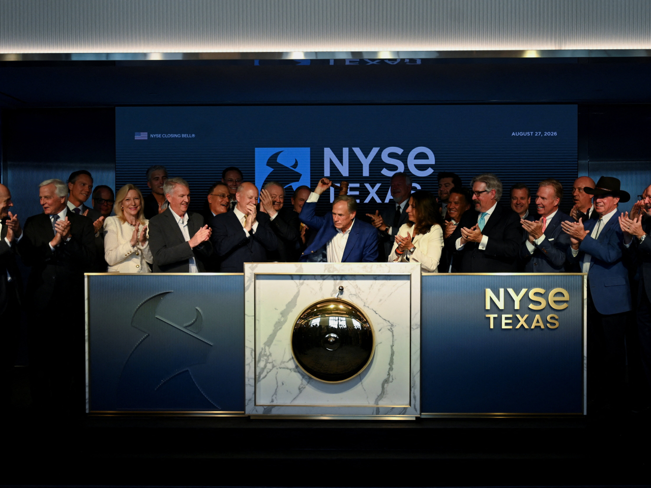 得州州長阿博特於NYSE Texas為收市敲鐘。（路透社）