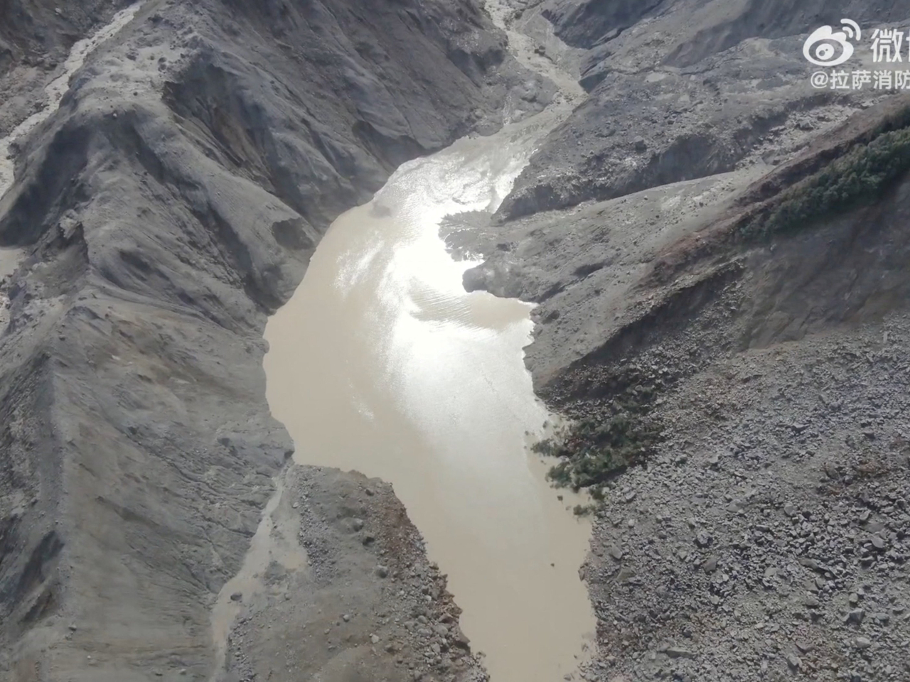 The lake straddles the border of China and Nepal and lies upstream from the Gyirong border crossing. Photo: Lhasa Fire and Rescue Mobile Detachment via Reuters