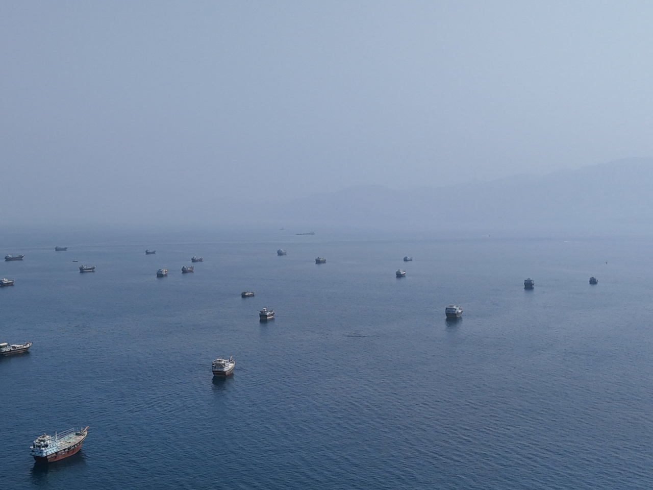 Dozens of vessels are seen near the Strait of Hormuz, which the US says has been cleared of mines. Photo: Reuters