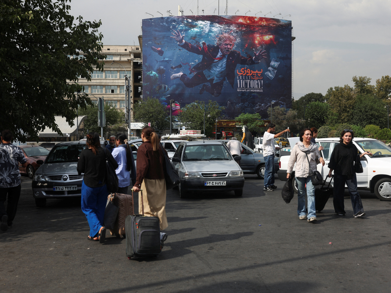 A billboard in Tehran portrays Donald Trump as being in deep water after being 'suckered' into waging war on ran. File photo: Reuters