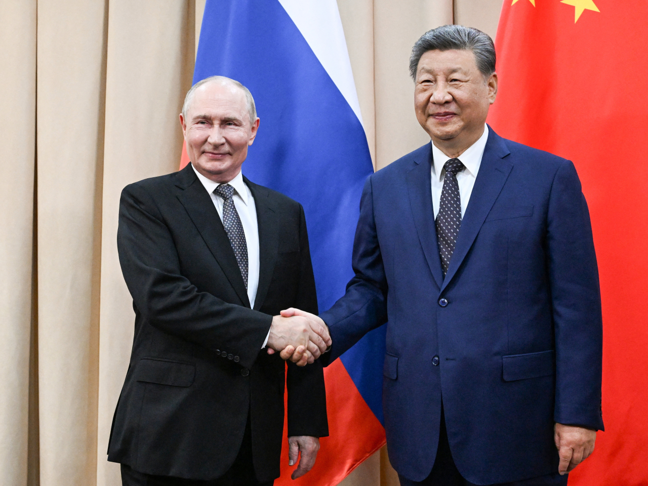 Xi Jinping says that under his and Vladimir Putin's strategic guidance, the foundation of China-Russia relations will become even stronger. Photo: Reuters