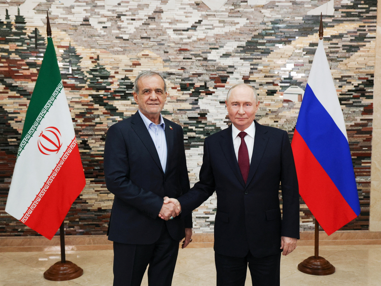 Masoud Pezeshkian meets Vladimir Putin at a meeting on the sidelines of the Shanghai Cooperation Organisation summit in Kyrgyzstan. Photo: Reuters