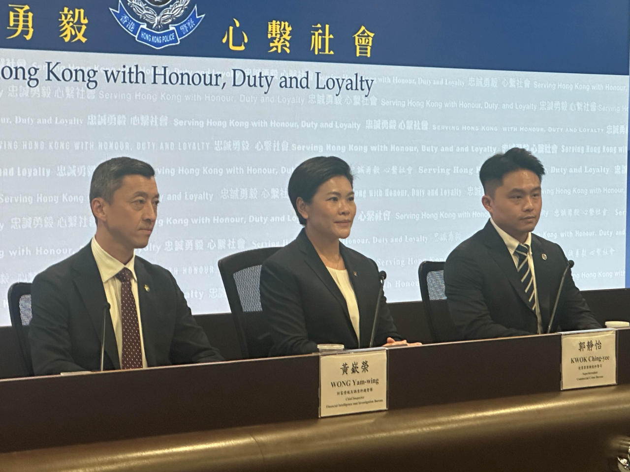 Superintendent Kwok Ching-yee, centre, says a victim lost nearly HK$4 million in a phone scam. Photo: RTHK