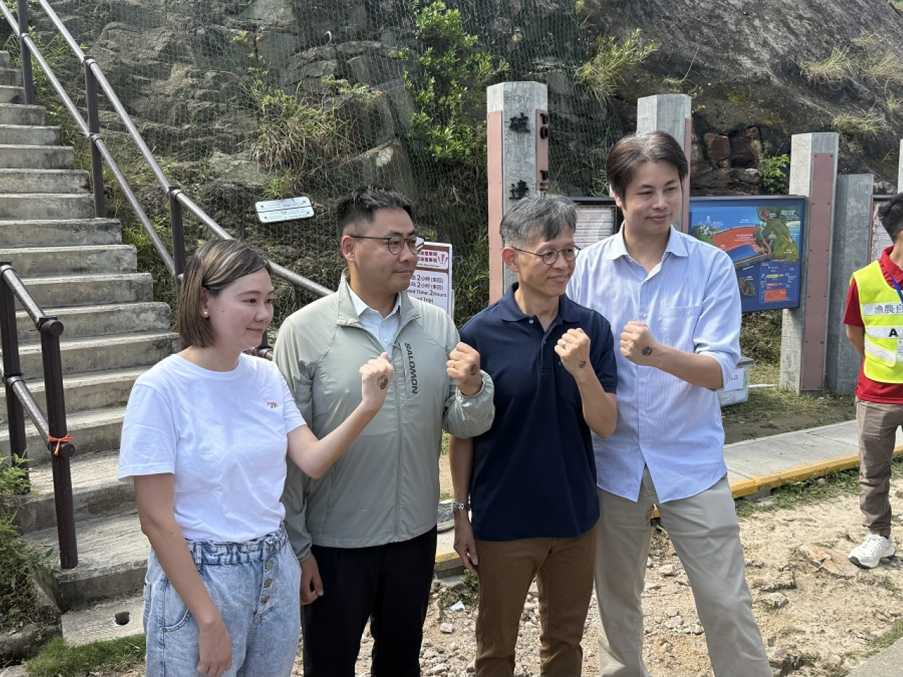 Mickey Lai (second right) says information centres have been set up to assist visitors. Photo: RTHK