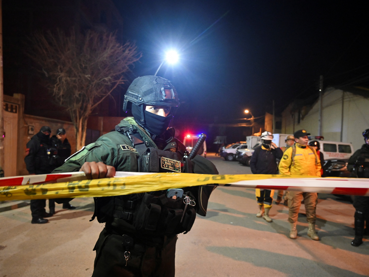 The area around the army barracks is cordoned off in the wake of the blasts in Viacha, Bolivia. Photo: Reuters