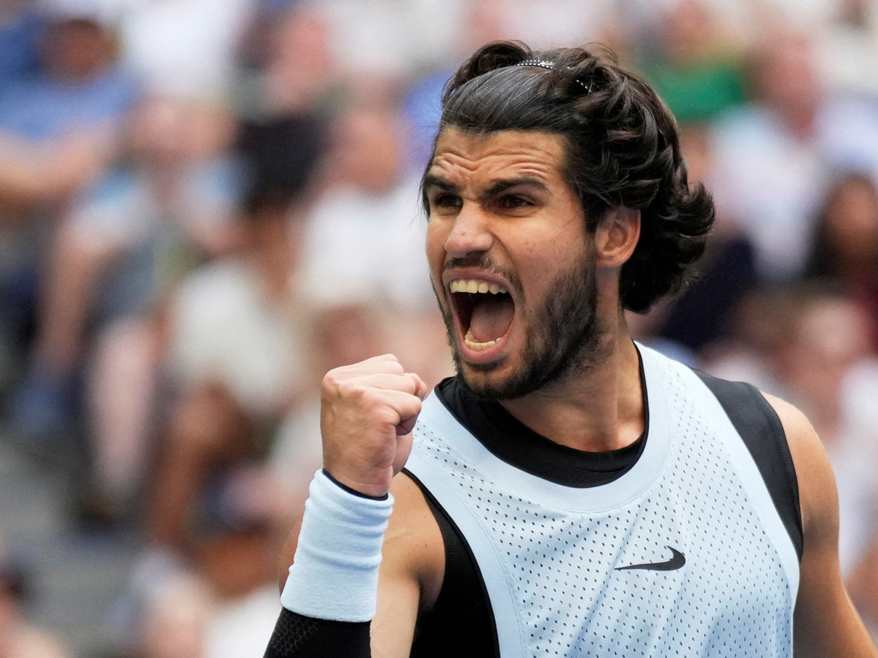 Alcaraz overcame a spirited challenge from home favourite Tommy Paul at Arthur Ashe Stadium. Photo: Reuters
