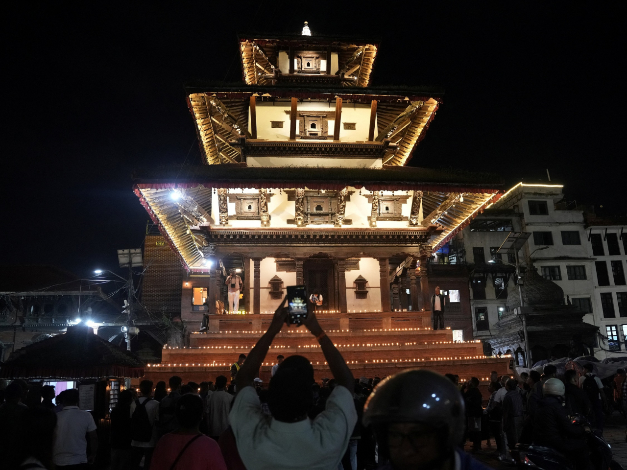 Butter lamps and candles are lit in the Basantapur Durbar Square in Kathmandu marking a national mourning day in Nepal. Photo: Reuters