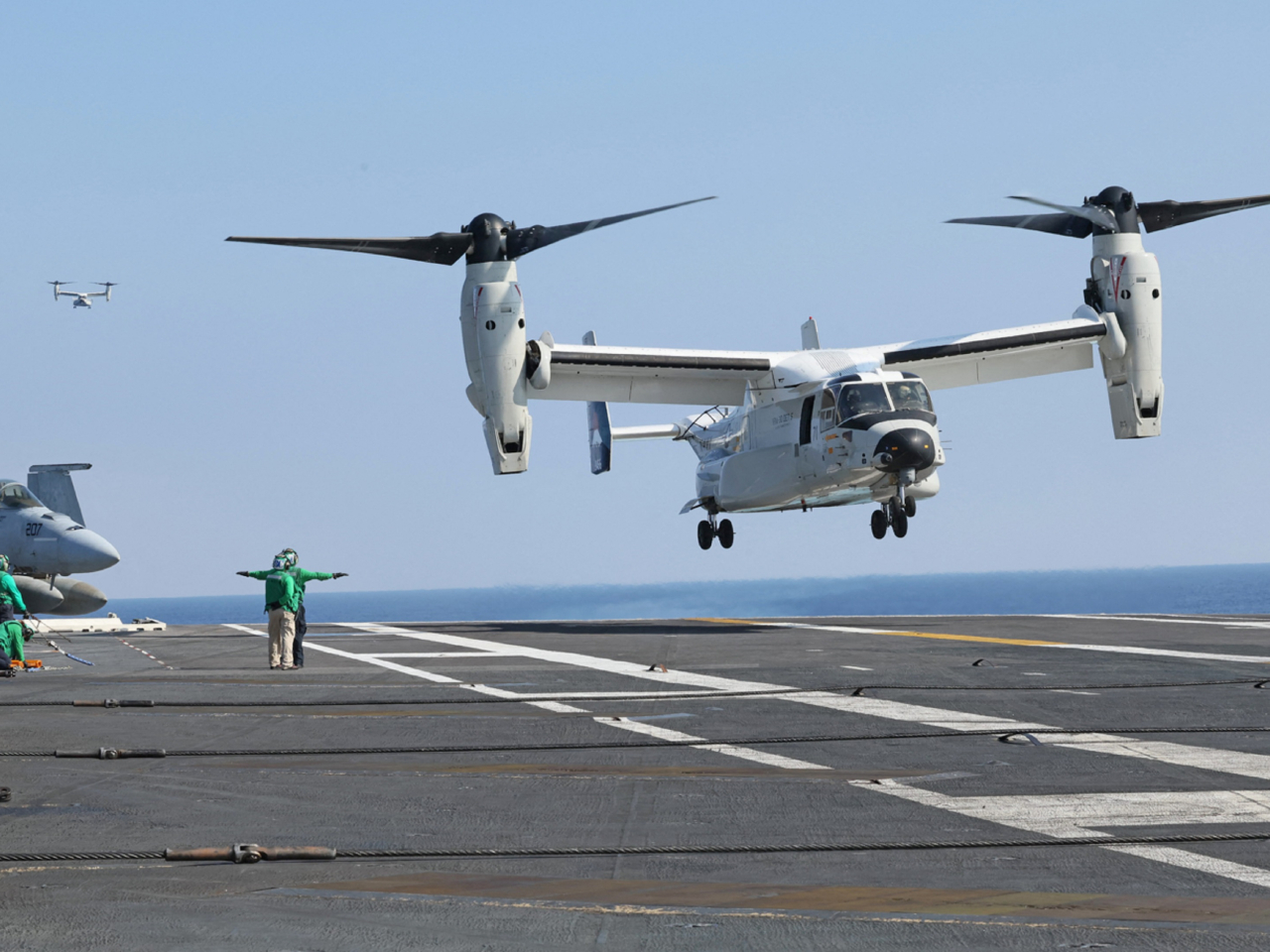金成基指美國主導的戰爭預演不斷上演。圖為前年美國、日本及韓國聯合軍演的情況。（法新社資料圖片）