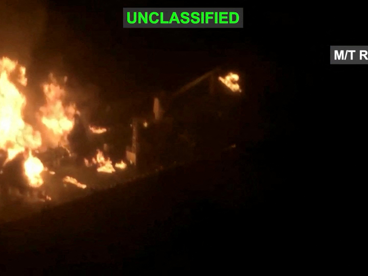 An Iranian crude oil carrier identified as M/T Riesco burns after being struck by US forces. Photo: Reuters via US Central Command.