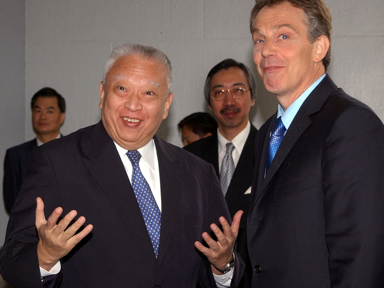 The life of Tung Chee-hwa (left) is one defined by patriotism, hard work and dedication, according to two key central government offices. File photo: Reuters