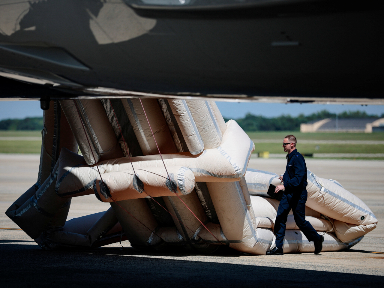 The emergency slide of Air Force One is inadvertently deployed at Joint Base Andrews in Maryland before US President Donald Trump boards. Photo: Reuters