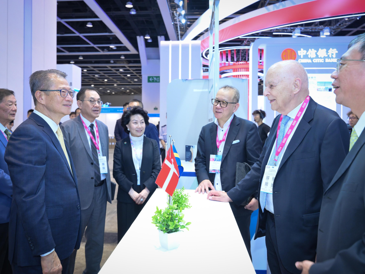 Financial Secretary Paul Chan tours an exhibition booth at the Biotechnology Investment Forum of BIOHK2026. Photo courtesy of Information Services Dept