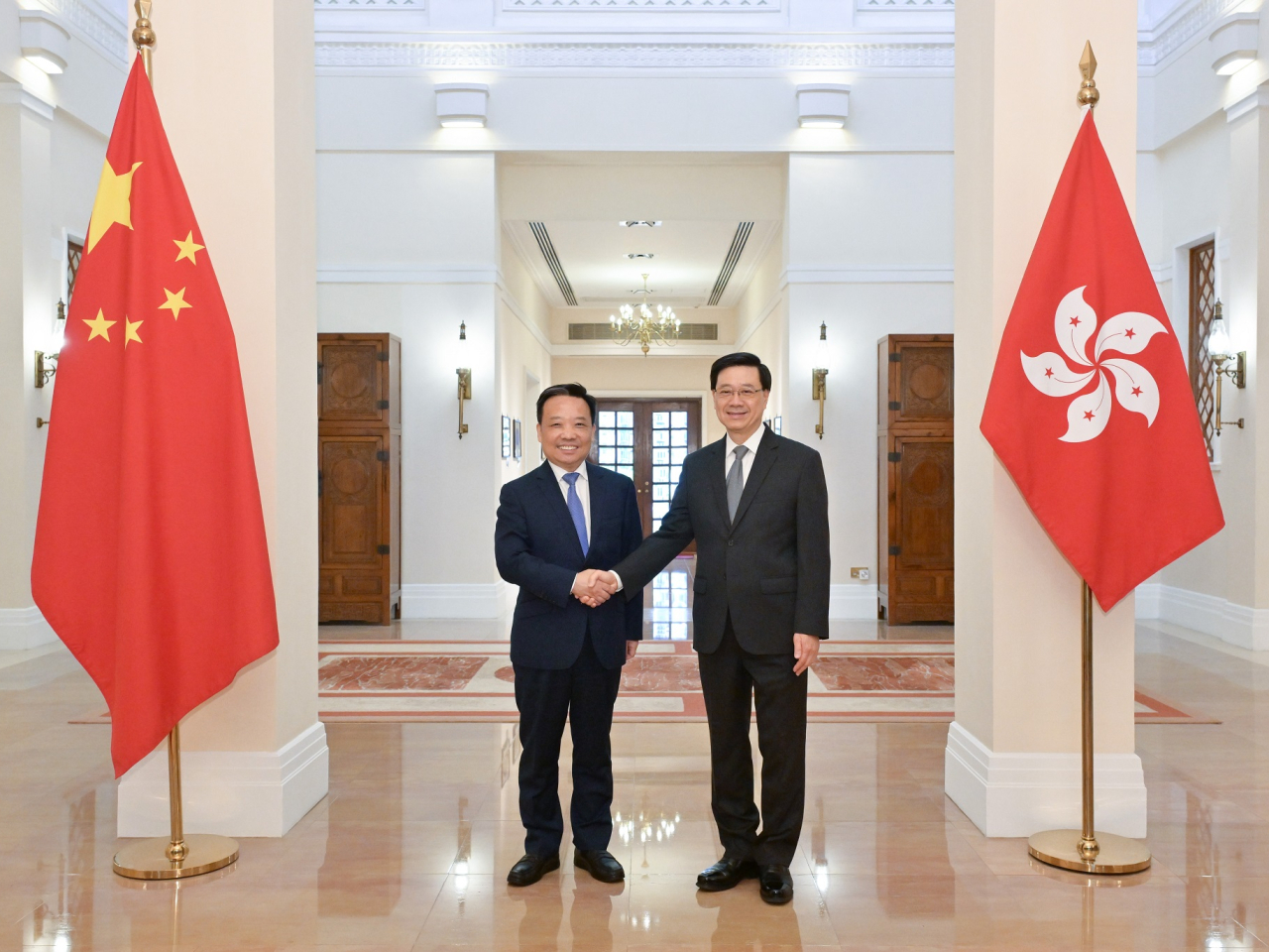 John Lee hosted Jin Lei at Government House on Thursday. Photo courtesy of the Information Services Department