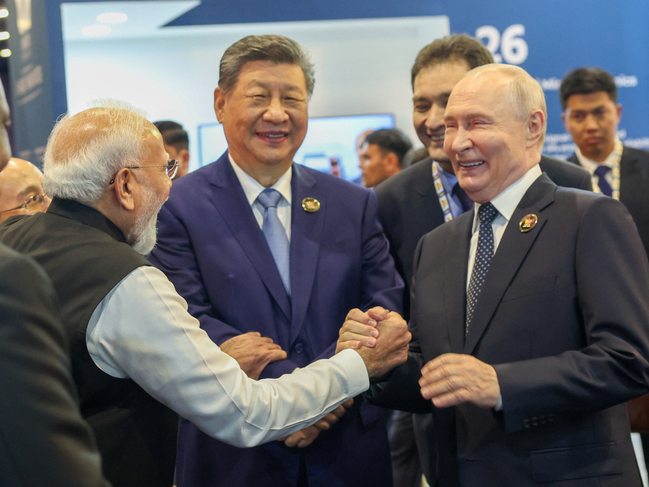 Leaders Narendra Modi, Xi Jinping and Vladimir Putin share a moment at the Brics summit in New Delhi, India. Photo: Reuters