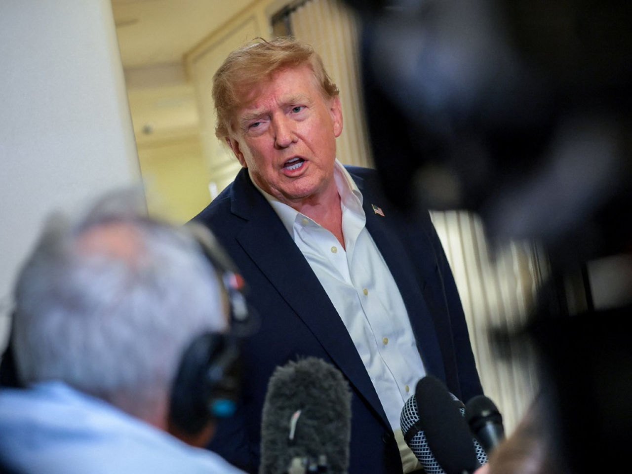 Donald Trump said the US already has guardrails in place to regulate and prosecute AI companies. Photo: Reuters