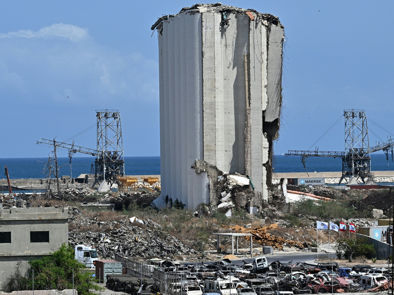 A judge says former president Michel Aoun knew fertiliser was being stored illegally at a warehouse in Beirut port, where an explosion killed at least 220 people. File photo: AFP