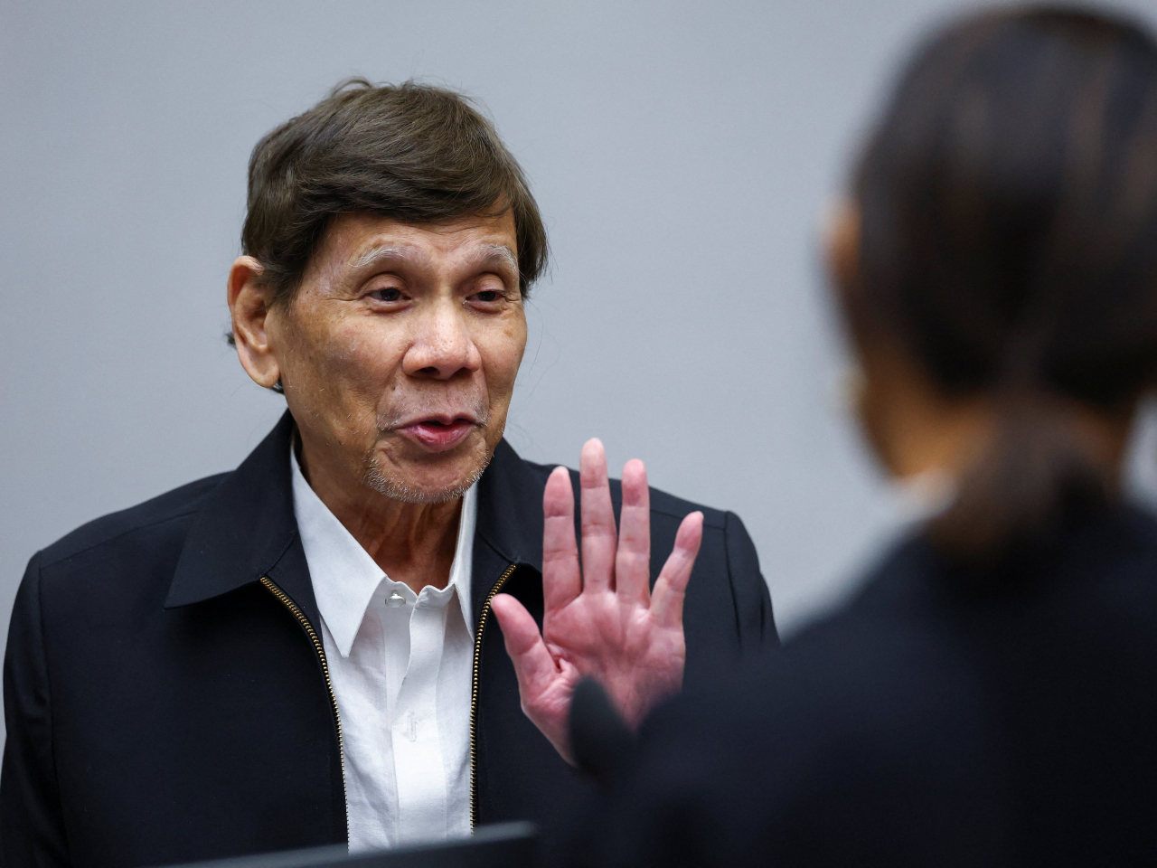 Rodrigo Duterte responds in an International Criminal Court exchange over his health and ability to stand trial in The Hague. Photo: Reuters
