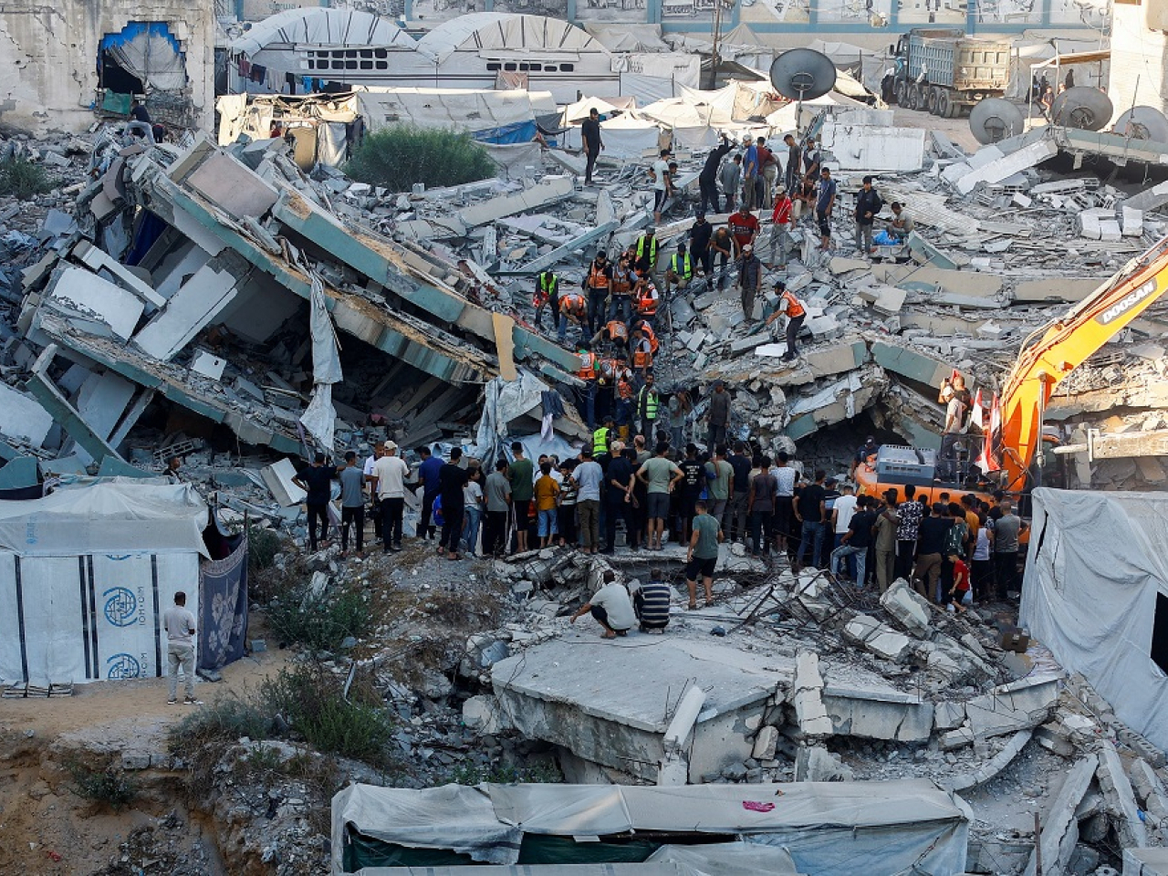 The building, which was housing more than 100 displaced people, had sustained damage from previous Israeli strikes. Photo: Reuters