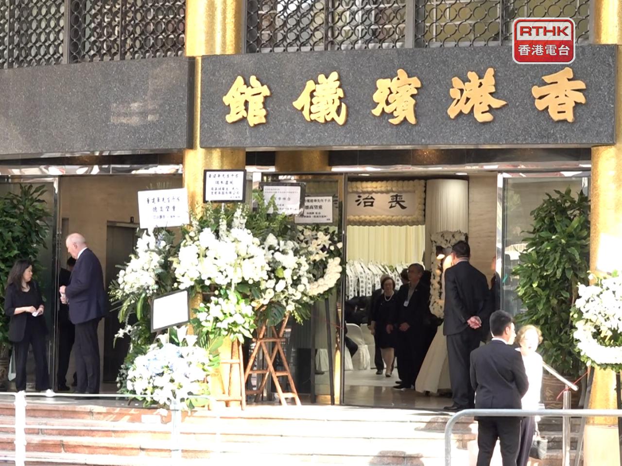 The funeral home is filled with wreaths dedicated to the late chief executive. Photo: RTHK