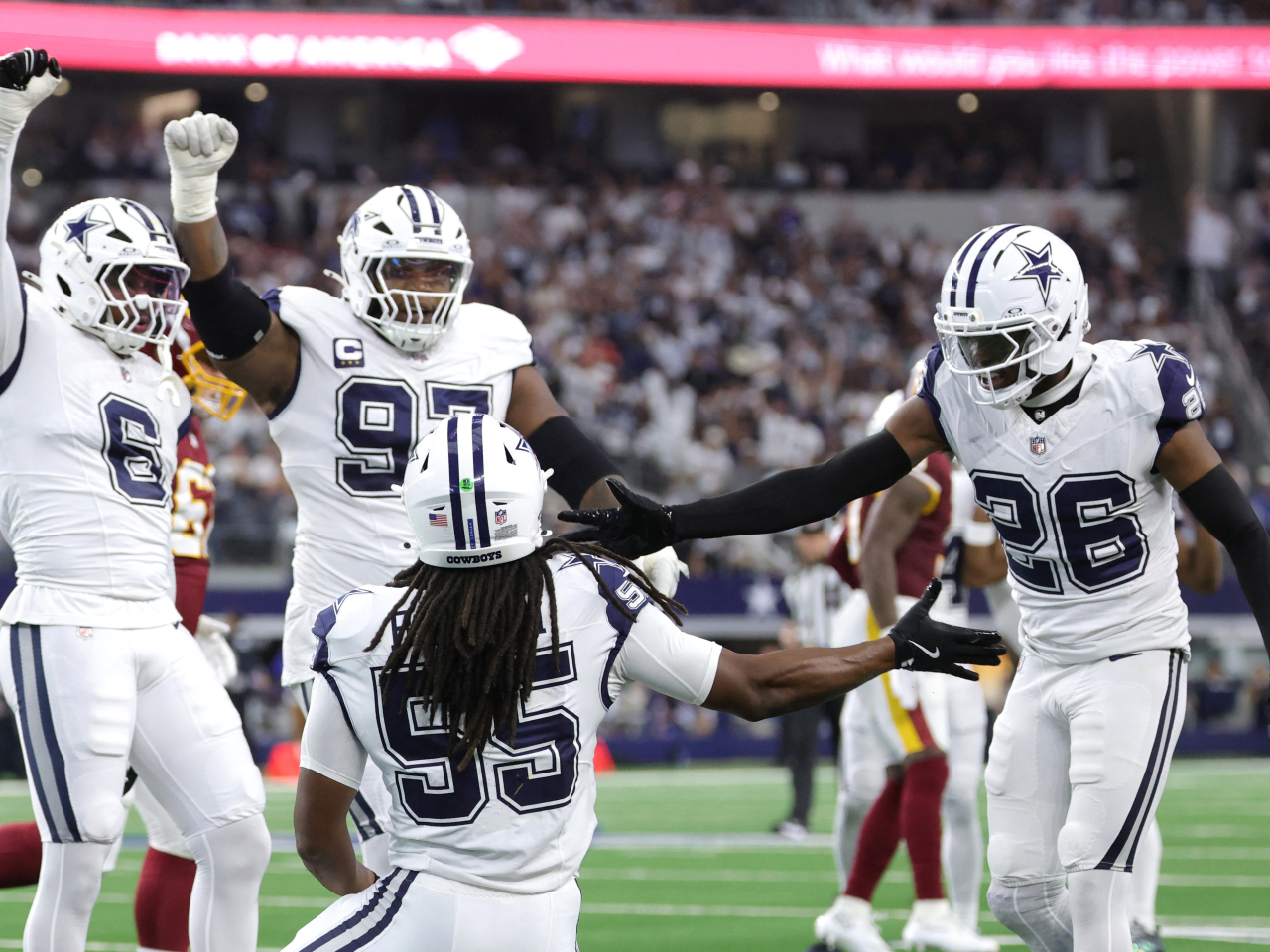 Dallas Cowboys players celebrate after a defensive play against the Washington Commanders during the first half at AT&T Stadium. Photo: Reuters