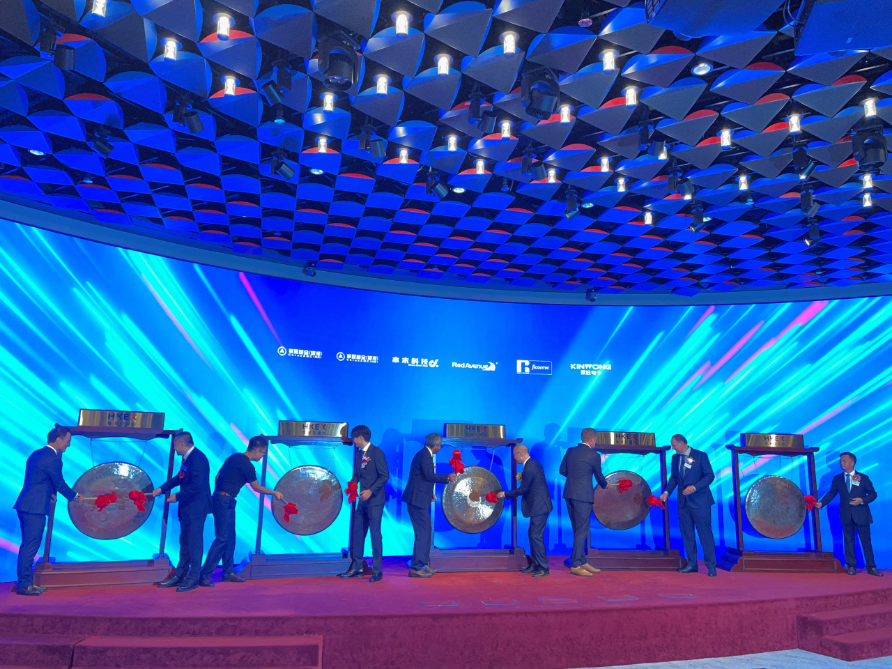 Executives of RoboTechnik, Shenzhen Kinwong Electronic, Direct Drive Tech, Red Avenue New Materials as well as ChinaAMC Franklin hit gongs in their IPO debuts. Photo: Reuters