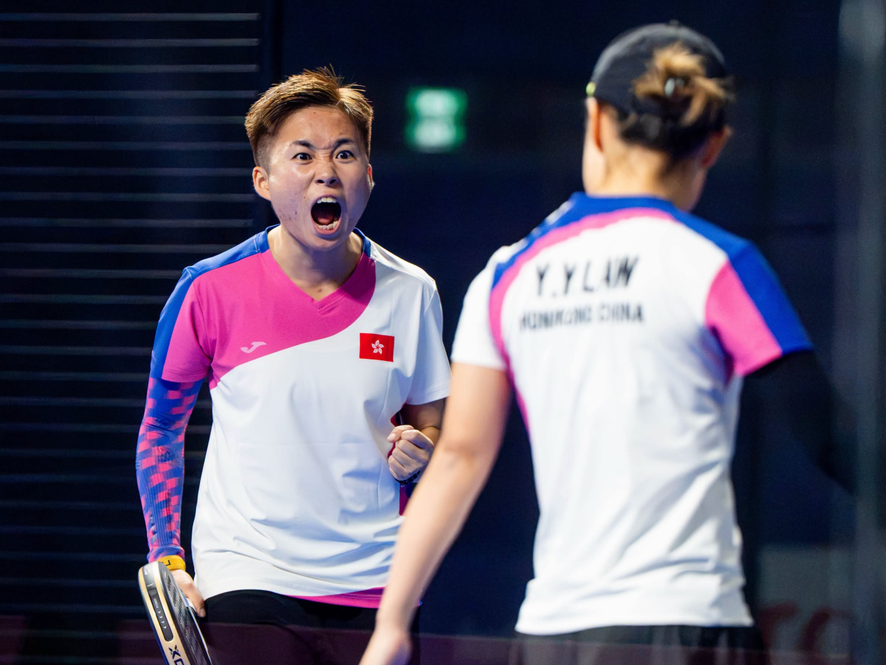 在亞運板網球項目，港隊女雙組合陳曉嵐羅易殷晉身八強。（港協暨奧委會）