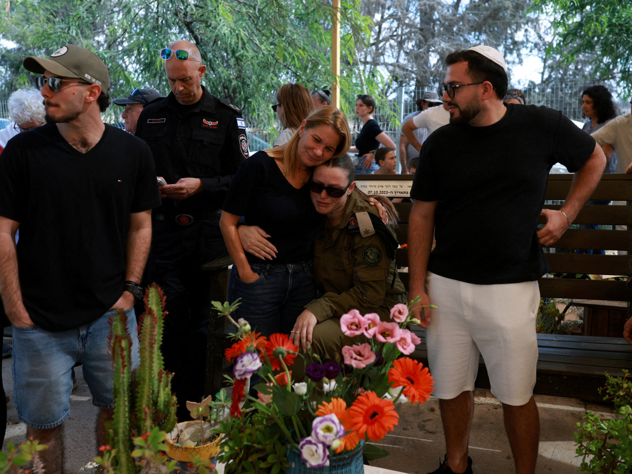 Israelis attend a memorial ceremony for members of the Kfar Aza community, one of the hardest hit communities of the deadly Hamas-led October 7 2023 attack. Photo: Reuters