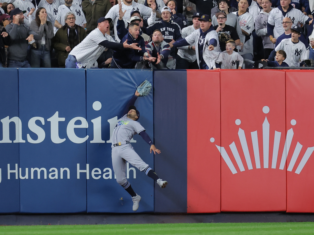 New York's potential game-tying two-run homer was ruled fan interference after a replay review. Photo: Reuters
