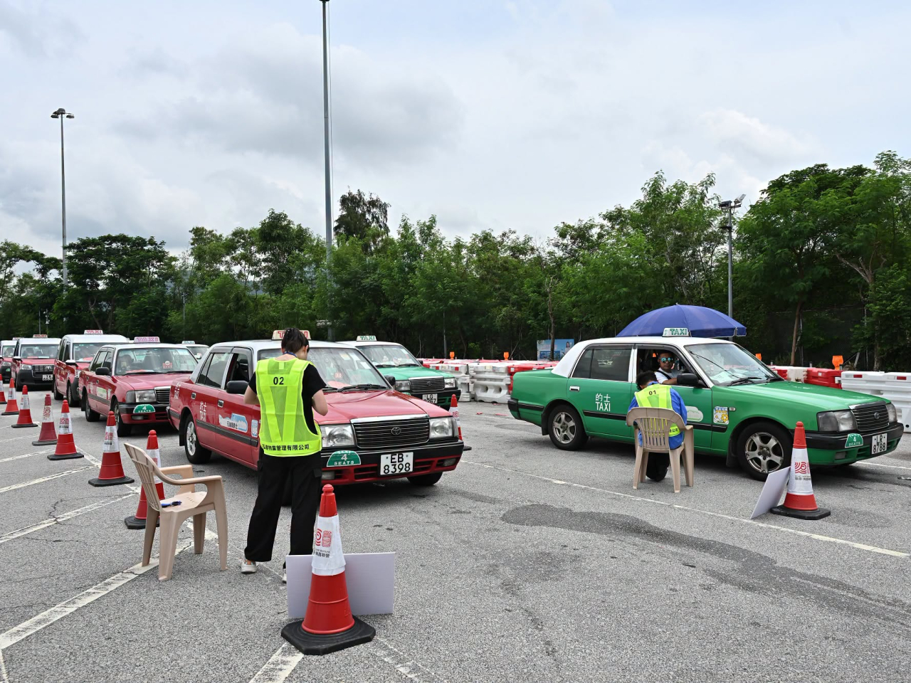Vacant cabs will first have to obtain a queue number before going to a taxi stand or boarding area. Photo courtesy of Transport Department social media page