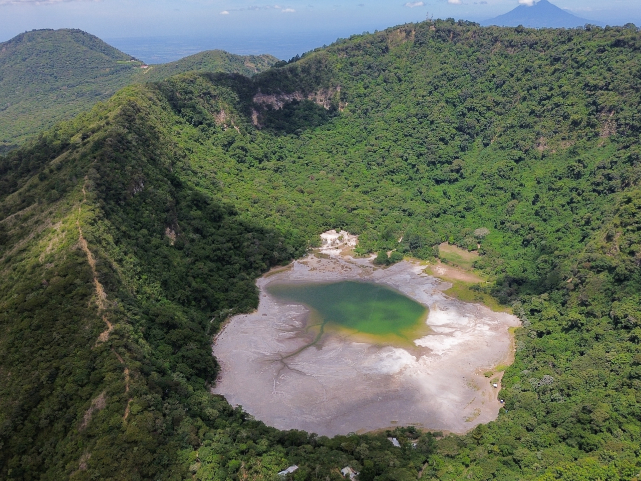 Prolonged dry conditions caused a lagoon in Alegria, El Salvador, to shrink drastically in size. Photo: Reuters