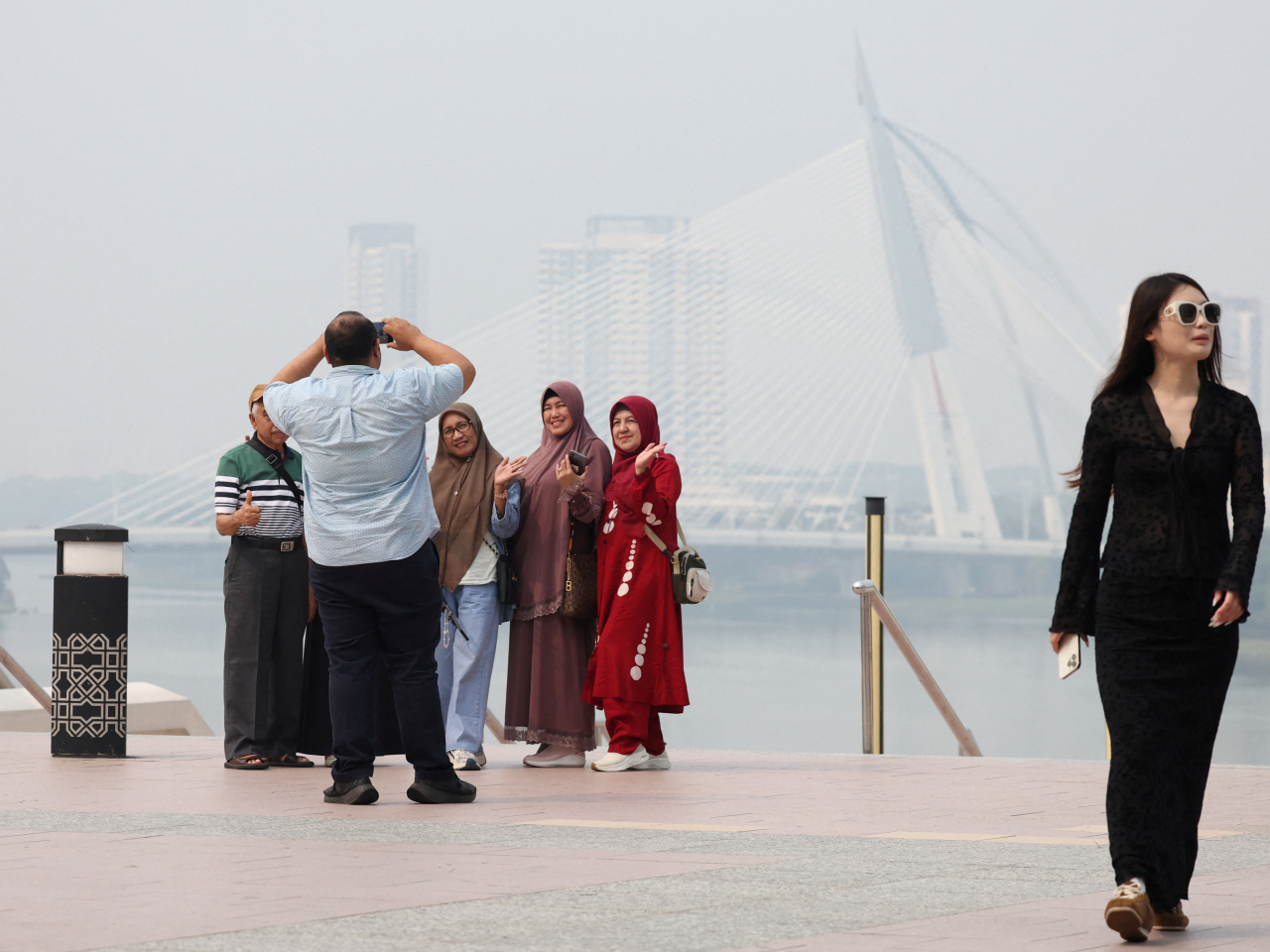 Haze blurs the experience for tourists in the Malaysian administrative capital of Putra Jaya. Photo: Reuters