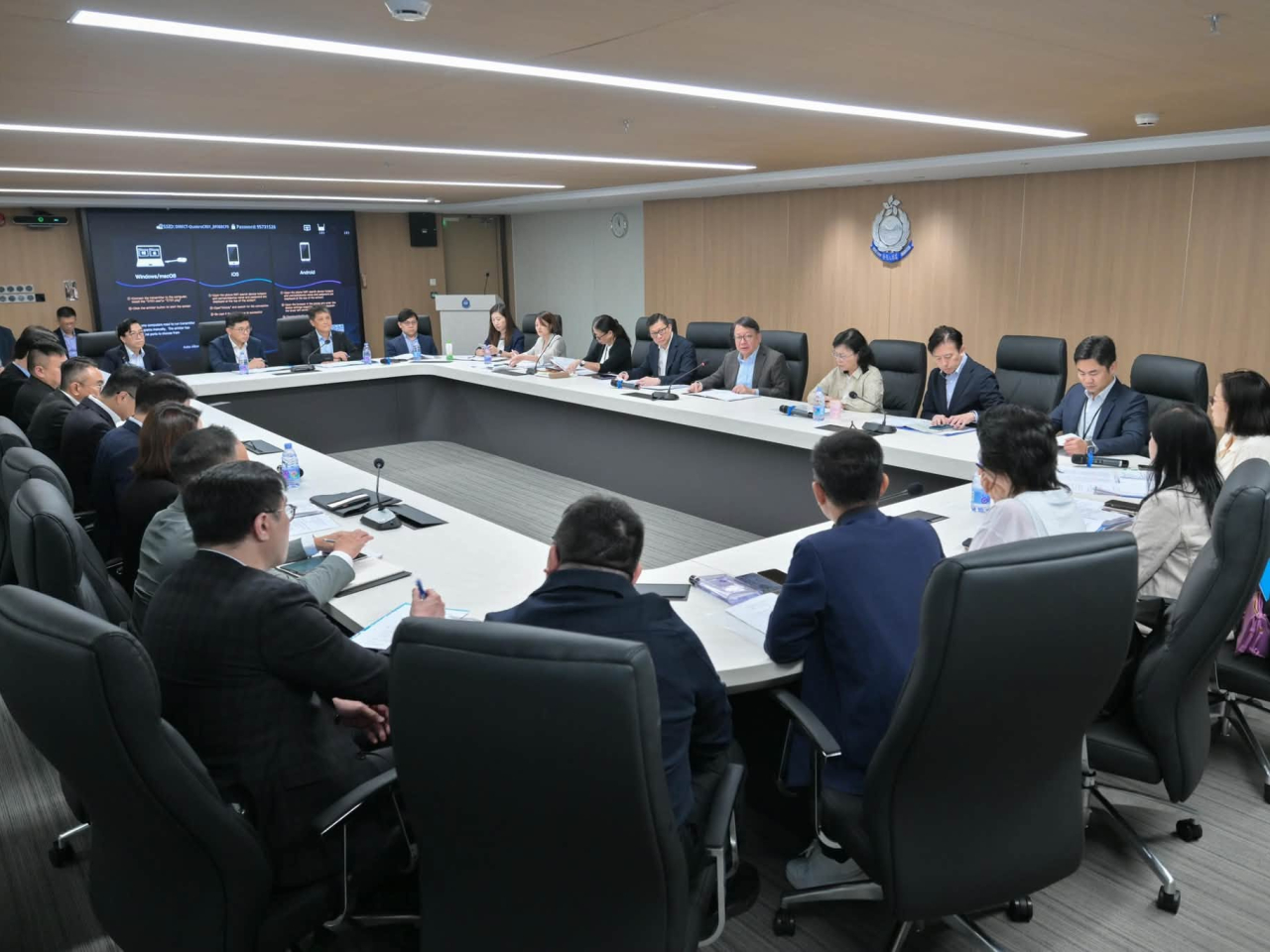Eric Chan chairs a meeting finalising arrangements for the Huanggang opening. Photo courtesy of Eric Chan's Facebook