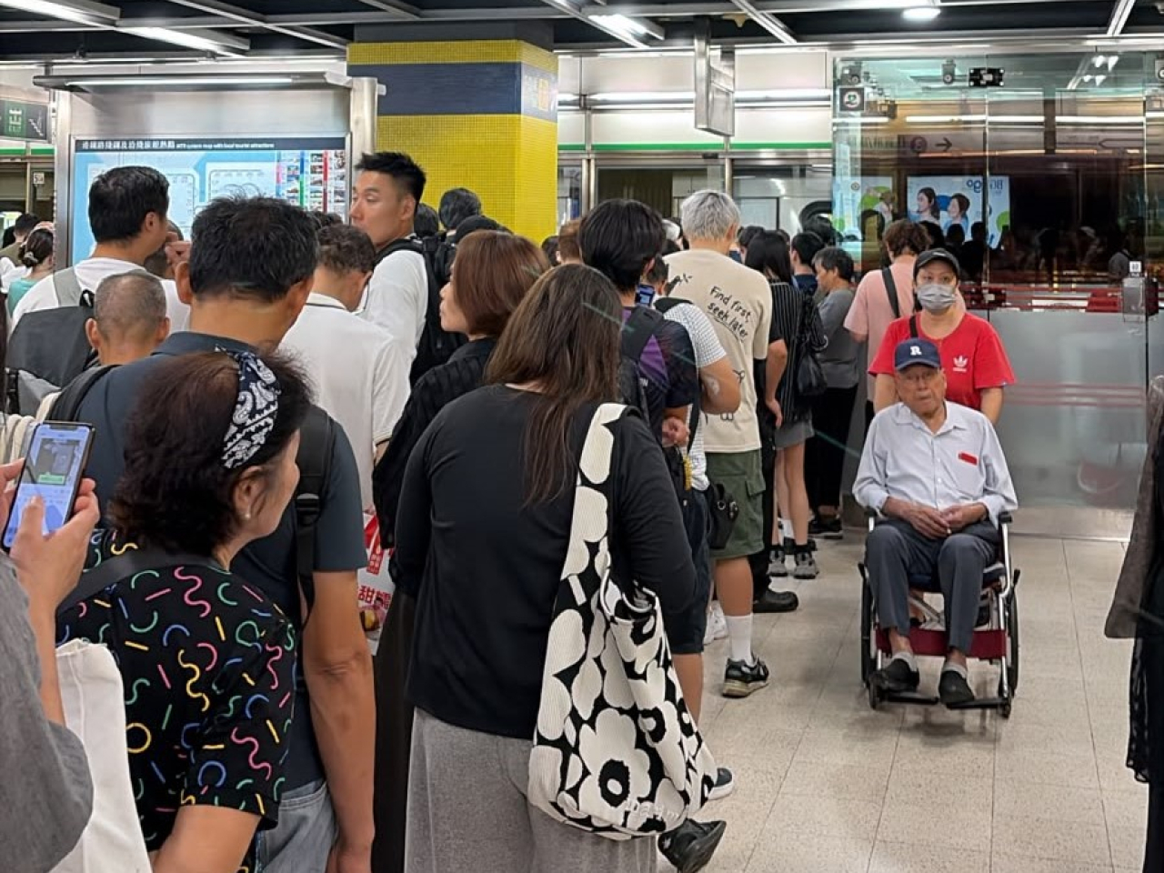 Some passengers are stranded at Yau Tong Station. Photo: RTHK