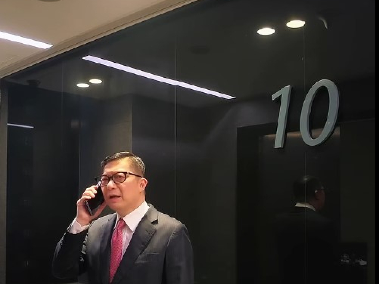 Chris Tang had invited a scam caller to find him in government headquarters. Photo courtesy of Chris Tang's social media
