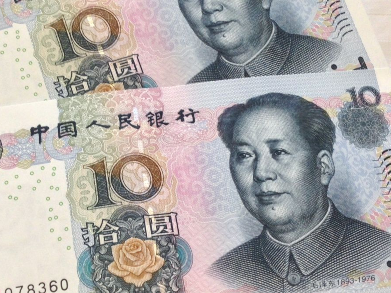 人民幣中間價報6.722兌1美元，較上日中間價升33點子。（港台圖片）