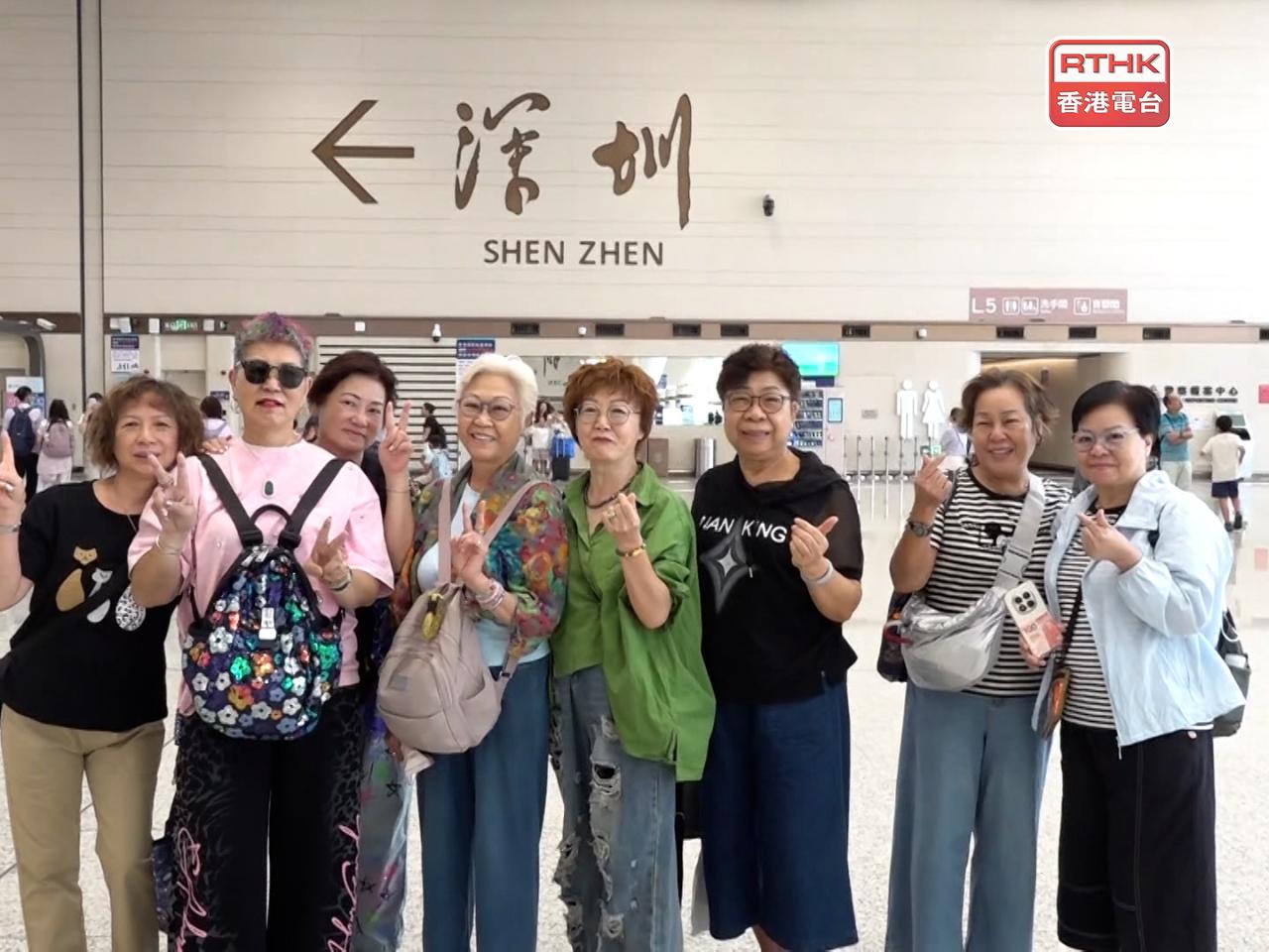 A group of travellers signal their first-time impression of Huanggang. Photo: RTHK