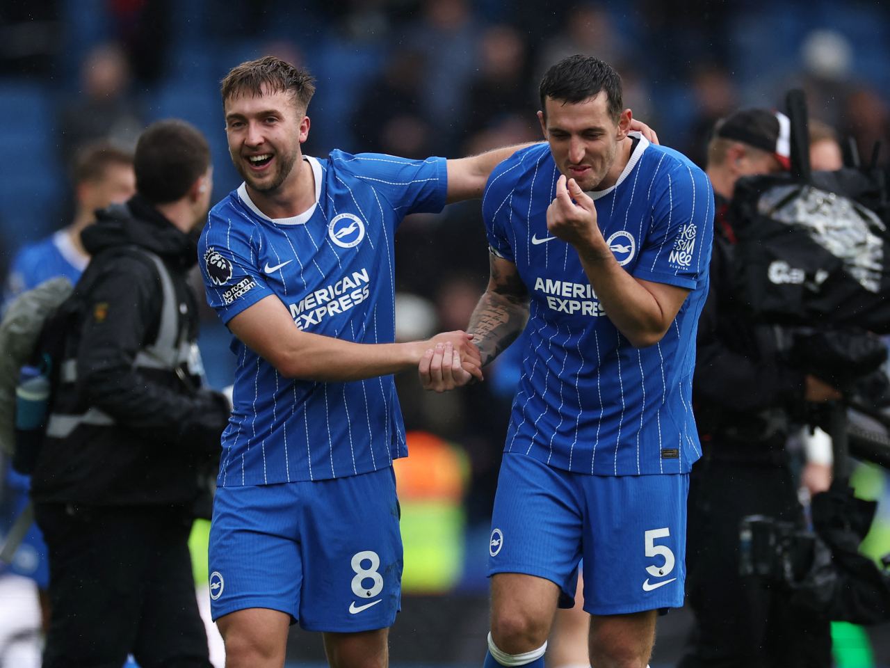 Brighton and Hove Albion's Jack Hinshelwood celebrates with Lewis Dunk after the match. Photo: Reuters