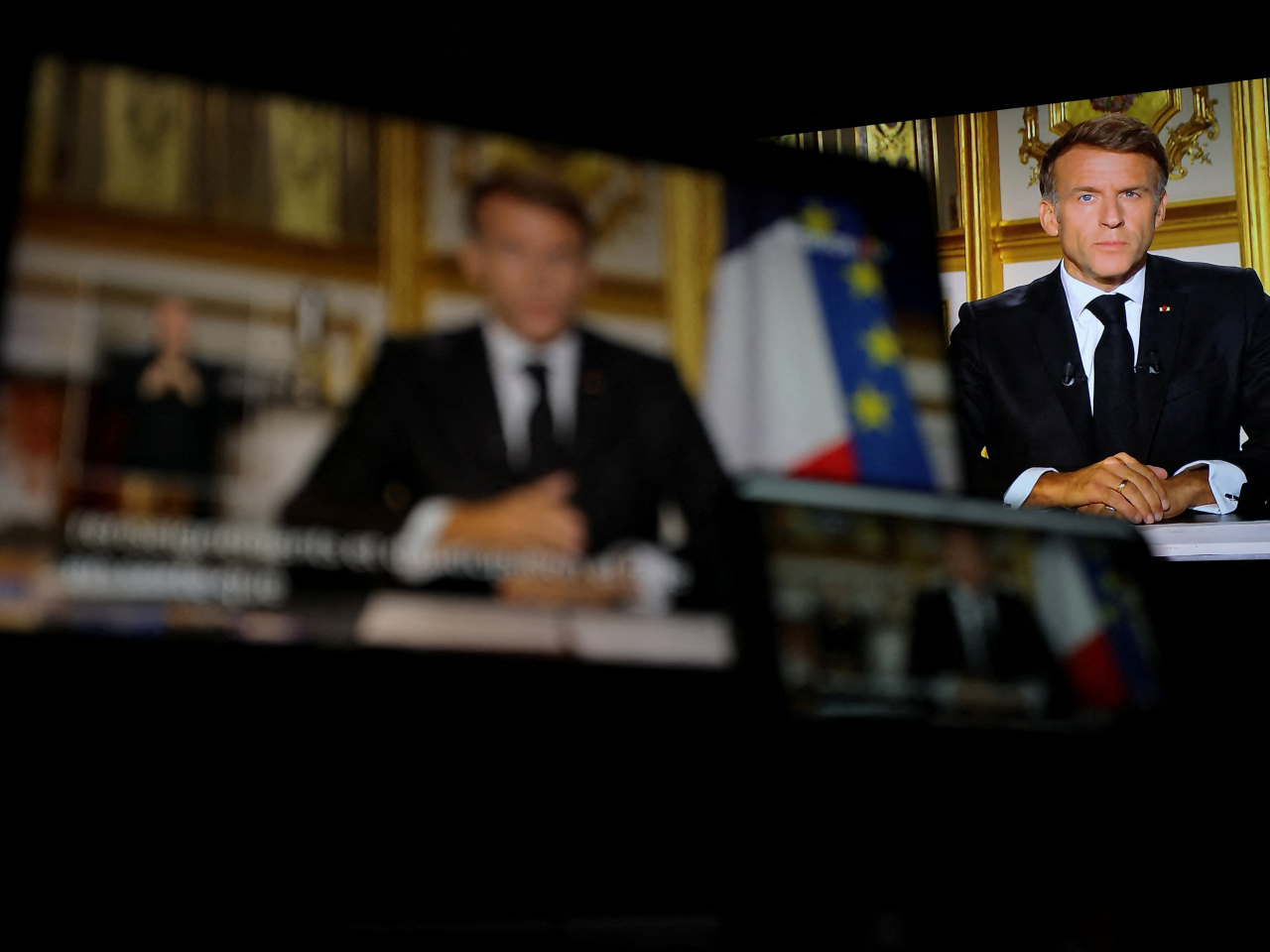 French President Emmanuel Macron addresses the nation a day after clashes during demonstrations against the cost of living and rising fuel prices. Photo: Reuters