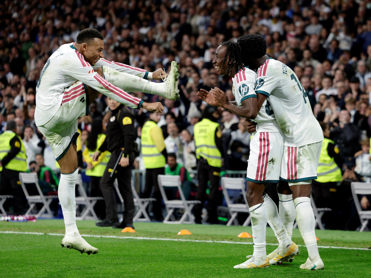 Real Madrid joy centres on Yan Diomande after he scores with Kylian Mbappe, left, and Aurelien Tchouameni joining in. Photo: Reuters
