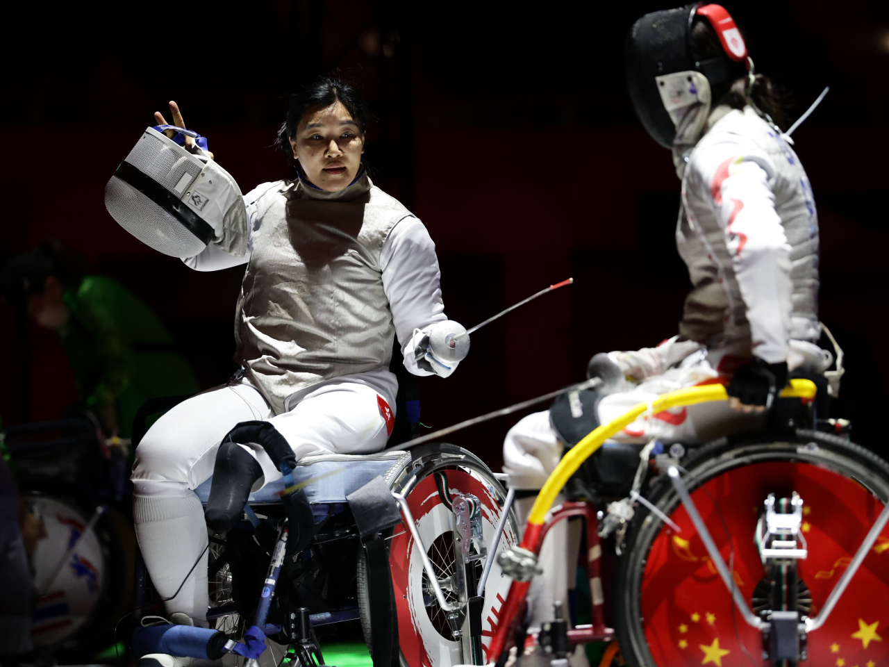 Alison Yu, left, wins bronze in the women&rsquo;s foil Category A. Photo courtesy of China Hong Kong Paralympic Committee