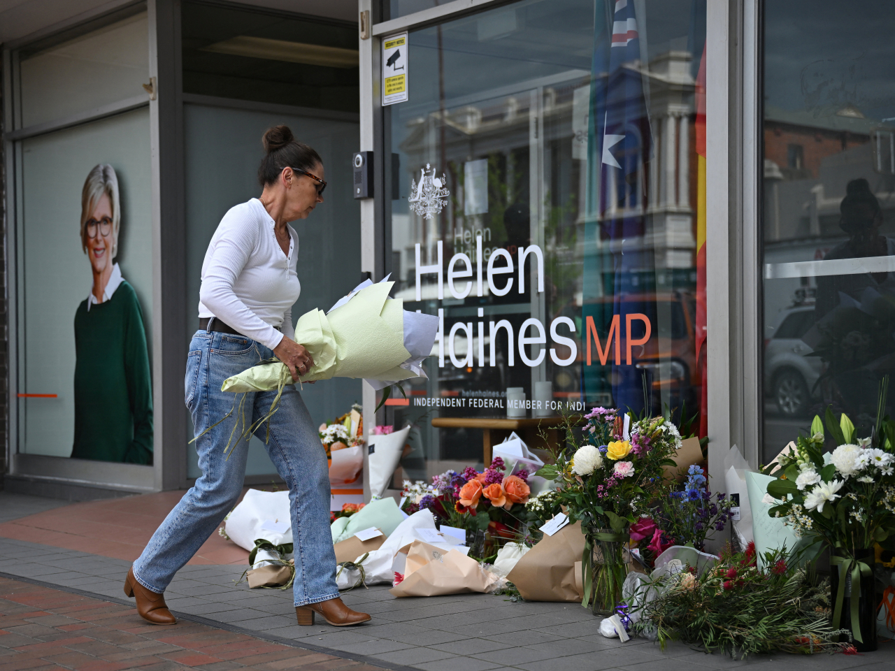 The attack on Helen Haines sparks an outpouring of community support at her electoral office in Wangaratta. Photo: Reuters