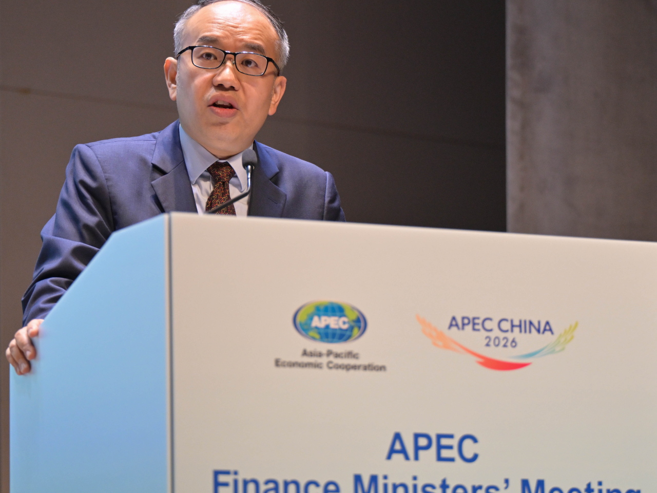 Christopher Hui delivers opening remarks at the Apec finance ministers' meeting seminar. Photo courtesy of Information Services Department