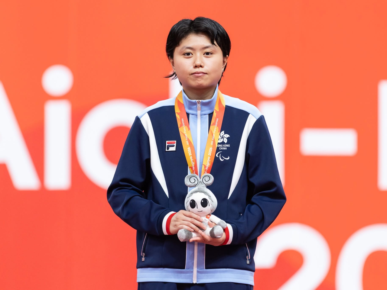 王婷莛以5:11落敗，局數輸2:3，為港隊奪得一面銀牌。（中國香港殘疾人奧委會）
