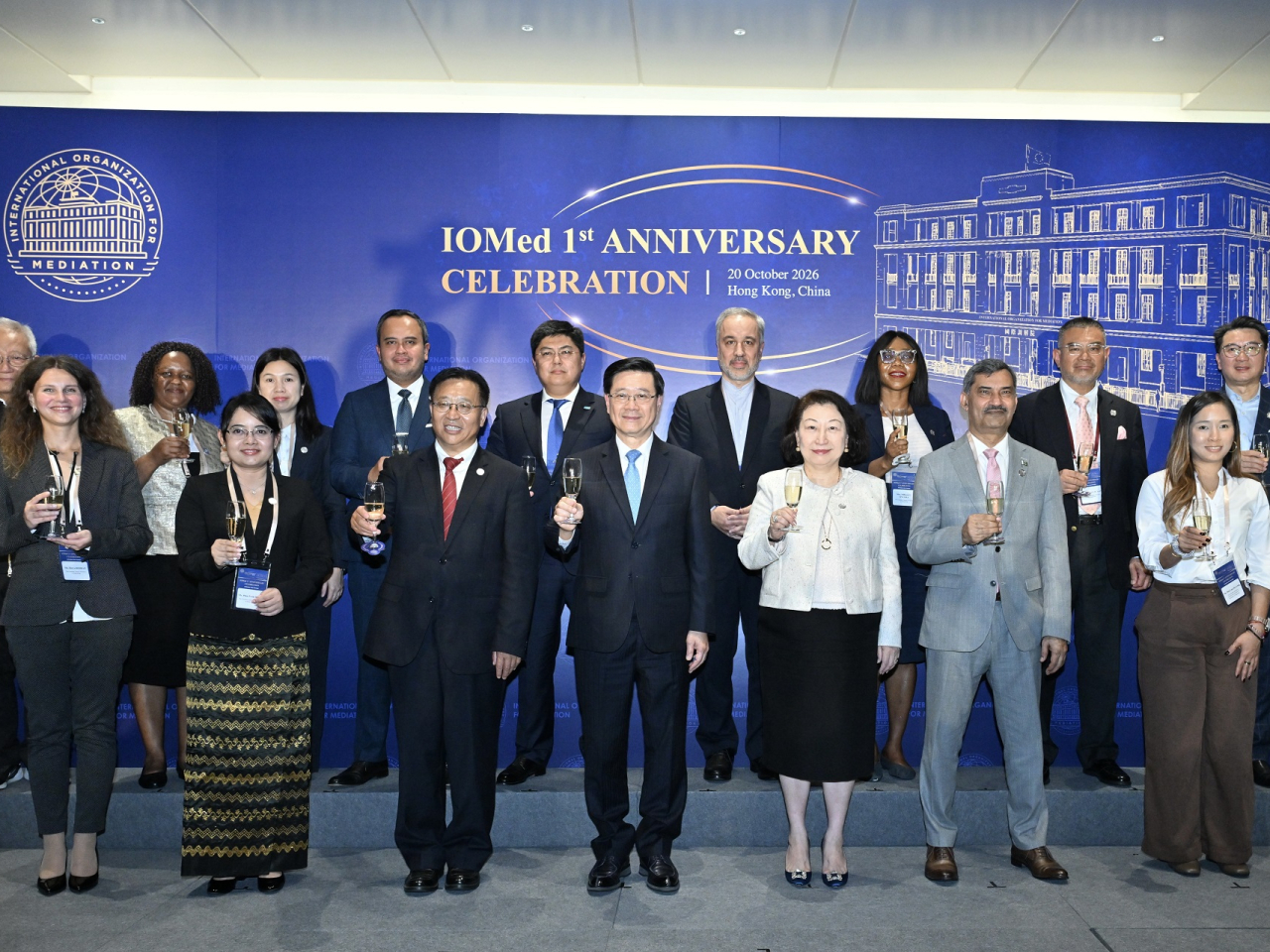 A cocktail reception is held at IOMed's headquarters to celebrate its first anniversary. Photo courtesy of the Information Services Department