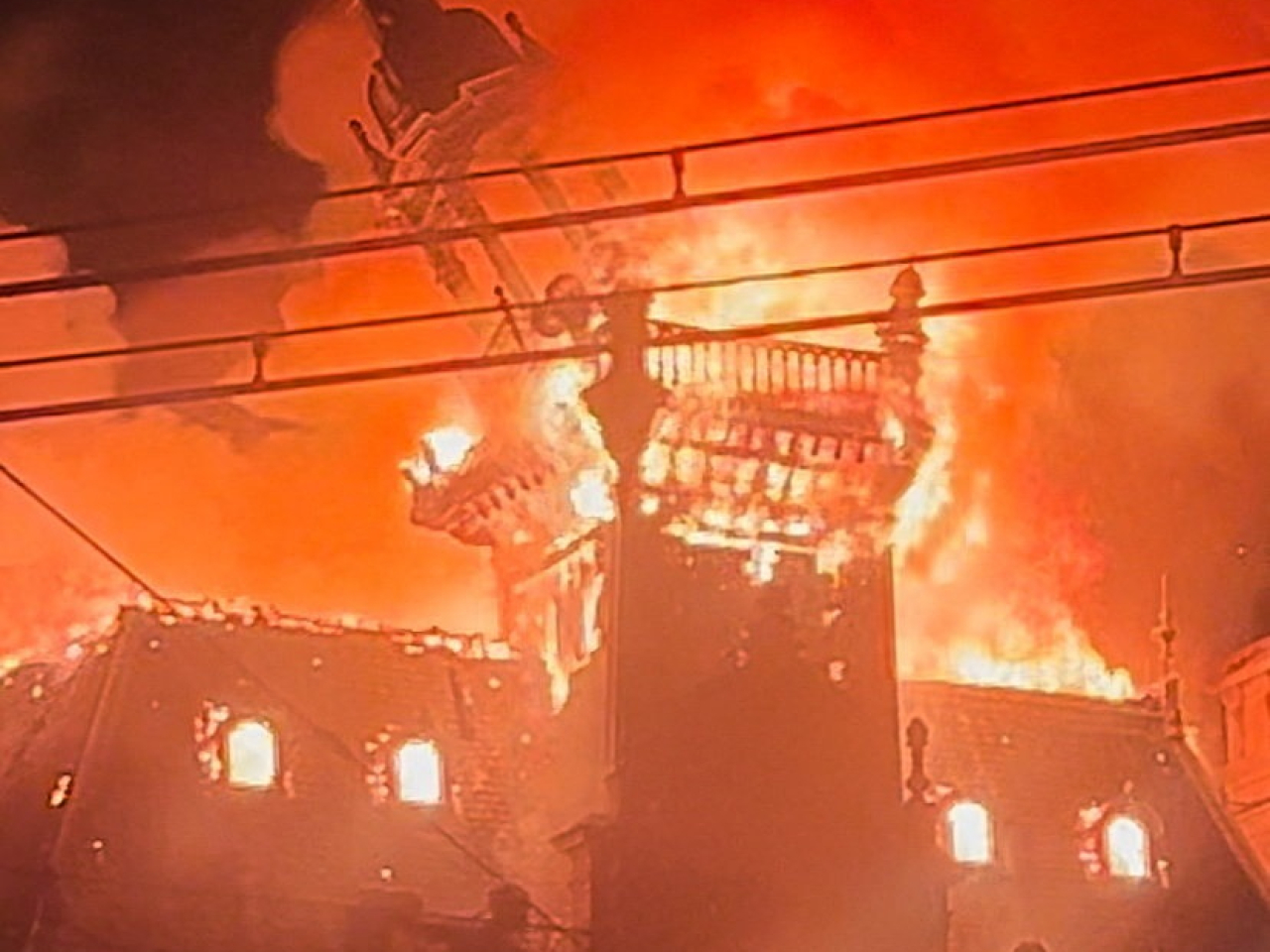 A man has been arrested over the burning down of an historic town hall in Limoges, whose destruction has become a symbol of the violence. Photo: Reuters