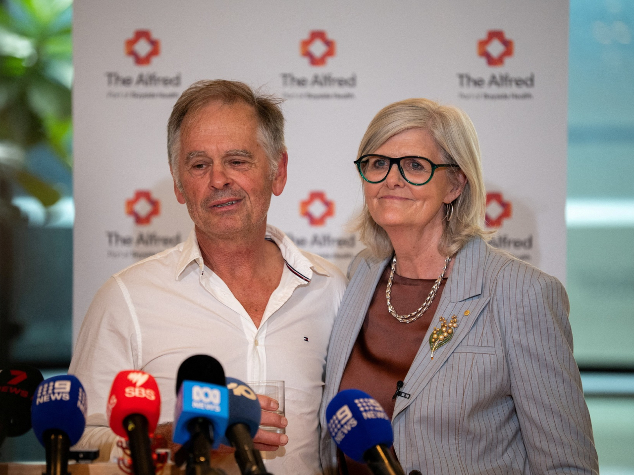 Phil Haines, left, says his wife has had both legs amputated in a press conference with Australia&rsquo;s Governor-General Sam Mostyn at Alfred Hospital in Melbourne. Photo: Reuters