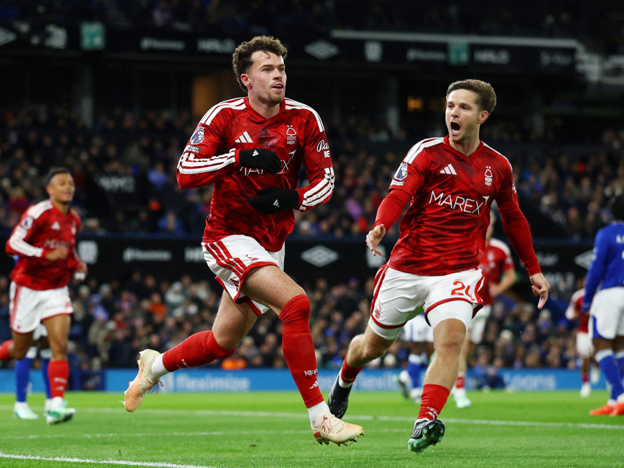 Neco Williams celebrates scoring the goal for Nottingham Forest with James McAtee. Photo: Action Images via Reuters