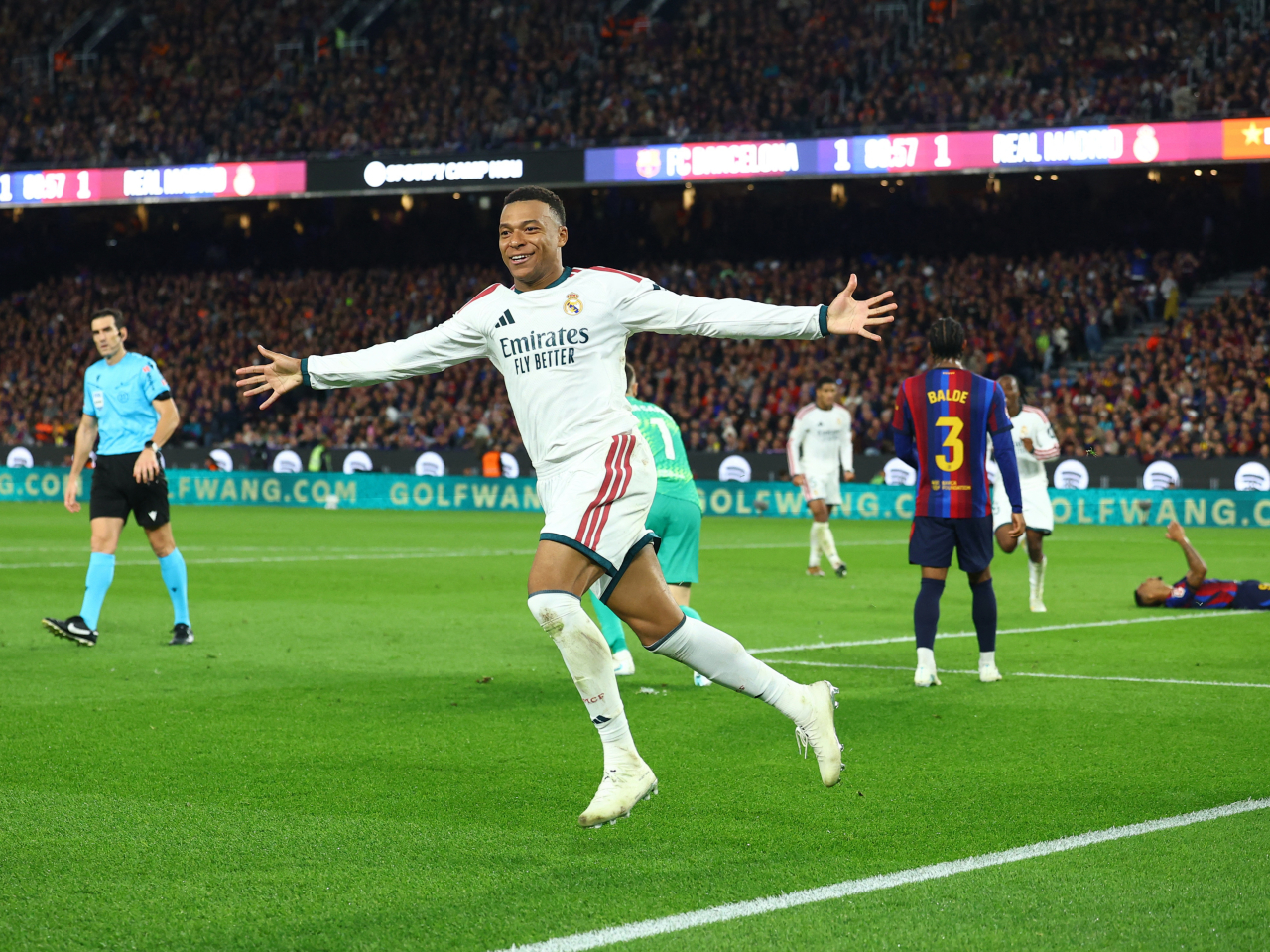 Mbappe scored in both halves as Real handed Barca their first domestic defeat of the season. Photo: Reuters