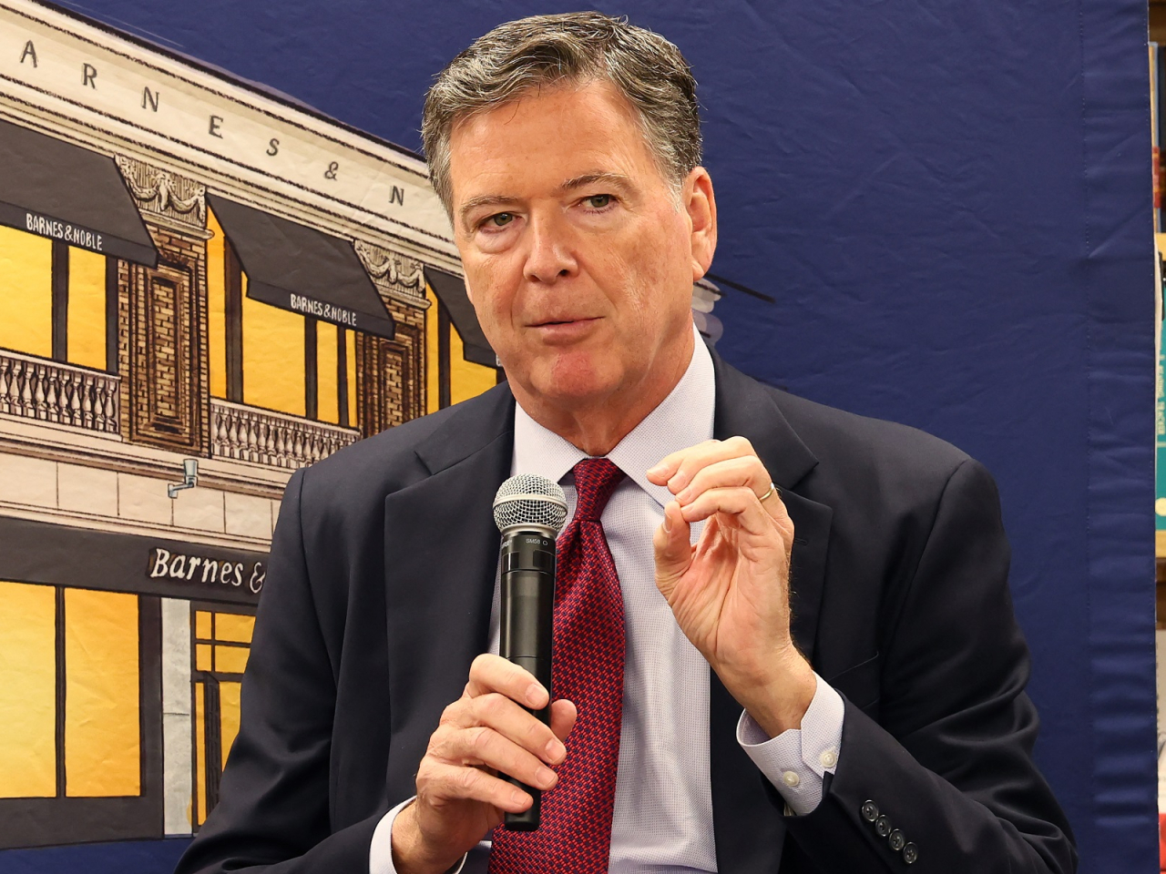 James Comey has been charged with disclosing national defence information, in the third criminal case against the ex-FBI director. File photo: AFP